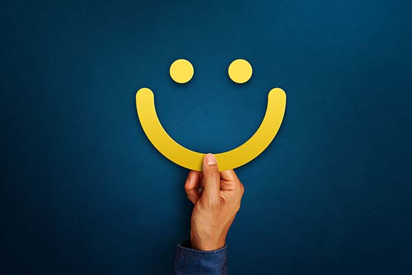 The Importance of Customer Reviews and How to Encourage Them - picture of a yellow smile