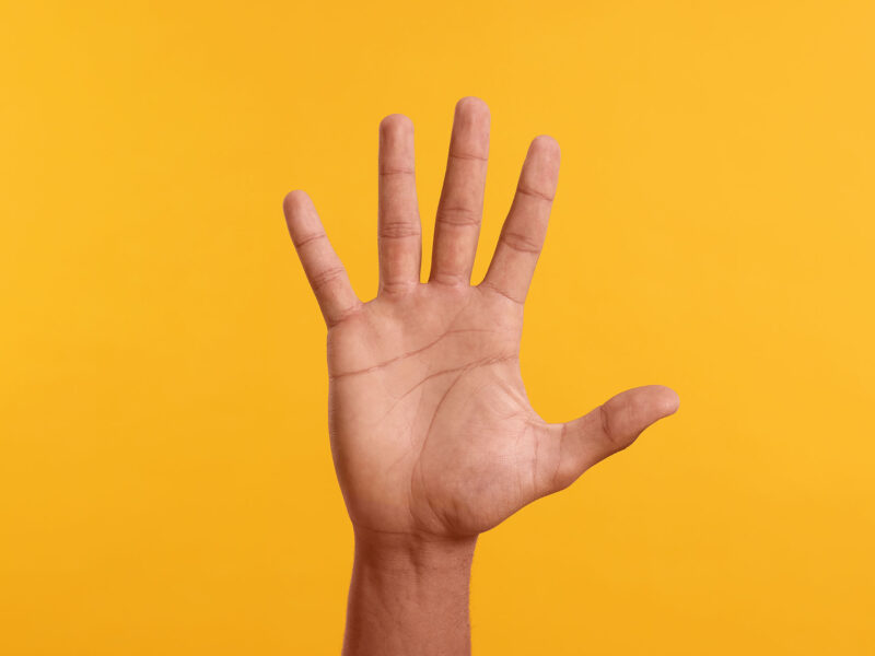 5 Website Tweaks That Instantly Improve Local SEO, this image shows a bright yellow background with a hand with 5 fingers up, concept for 5 tips