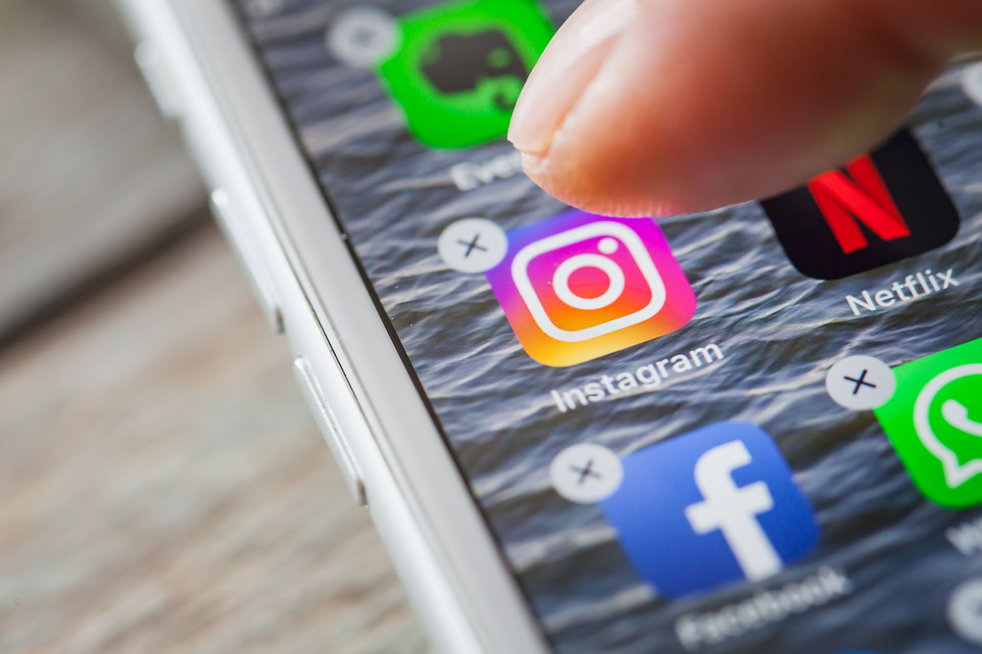 Close-up of Instagram app icon on smartphone screen representing social media usage - Stop Fighting the Instagram Feed