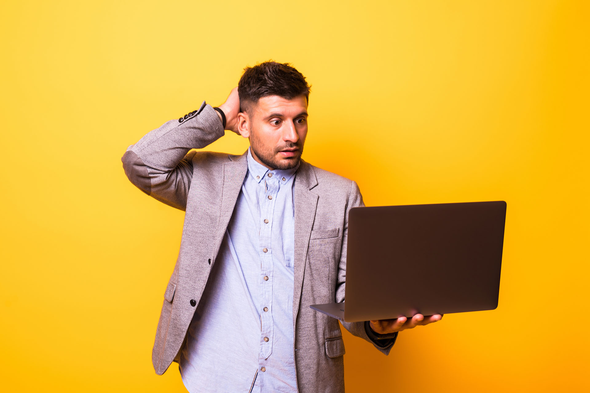 Business owner reviewing website performance and trying to identify hidden clarity issues