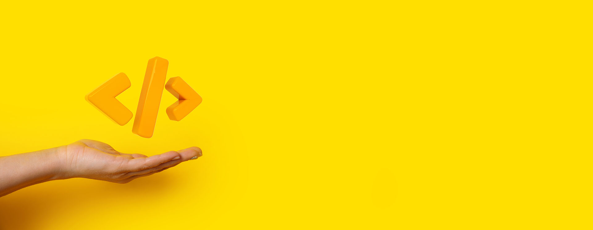 Outstretched hand beneath orange code brackets on a yellow background.